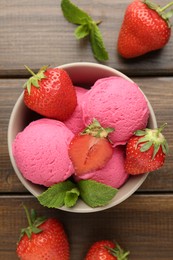 Photo of Tasty sorbet with strawberries and mint served on wooden table, flat lay