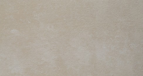 Photo of Cement textured surface as background, closeup view