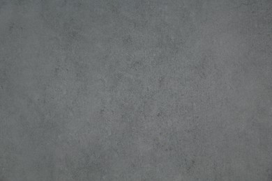 Photo of Cement textured surface as background, closeup view