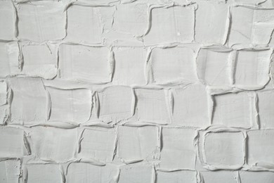 Photo of White textured surface as background, closeup view