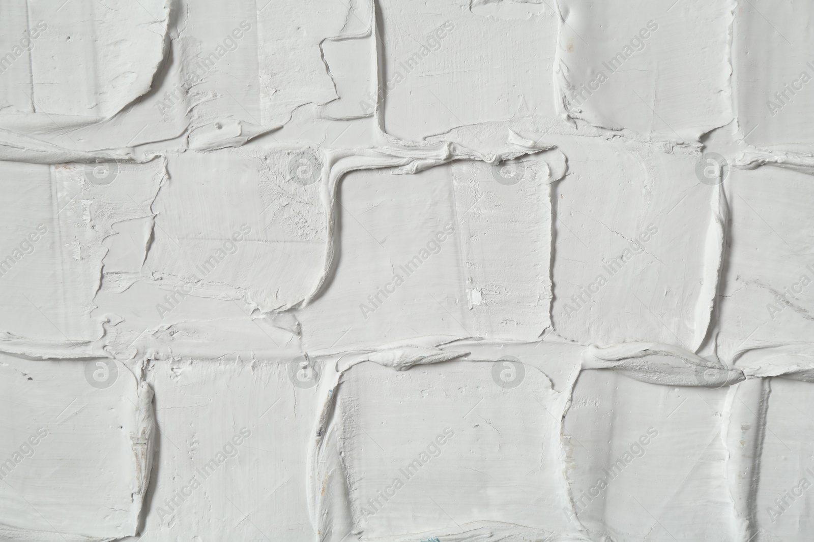 White textured surface as background, closeup view Photo of White textured surface as background, closeup view