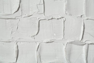 Photo of White textured surface as background, closeup view