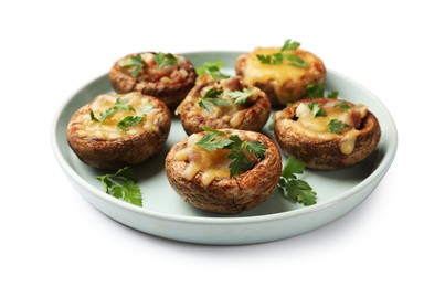 Photo of Many tasty stuffed mushrooms isolated on white