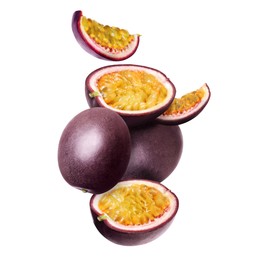 Image of Delicious ripe passion fruits falling on white background