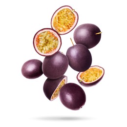 Image of Delicious ripe passion fruits falling on white background