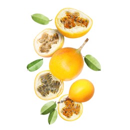 Image of Delicious ripe passion fruits and green leaves falling on white background