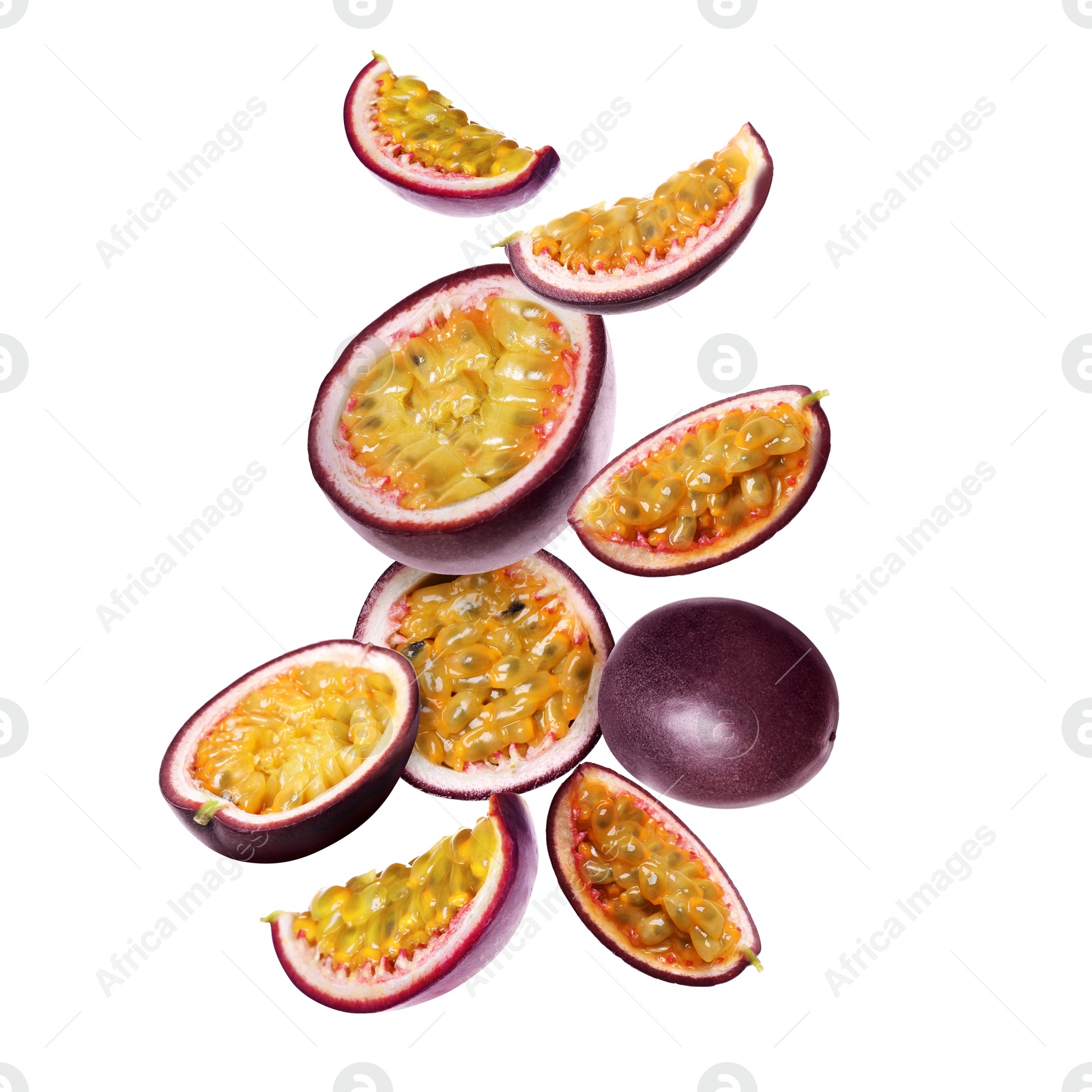 Delicious ripe passion fruits falling on white background Image of Delicious ripe passion fruits falling on white background