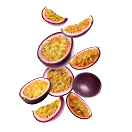 Image of Delicious ripe passion fruits falling on white background