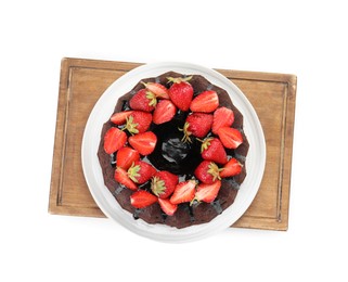 Photo of Delicious chocolate bundt cake with strawberries isolated on white, top view