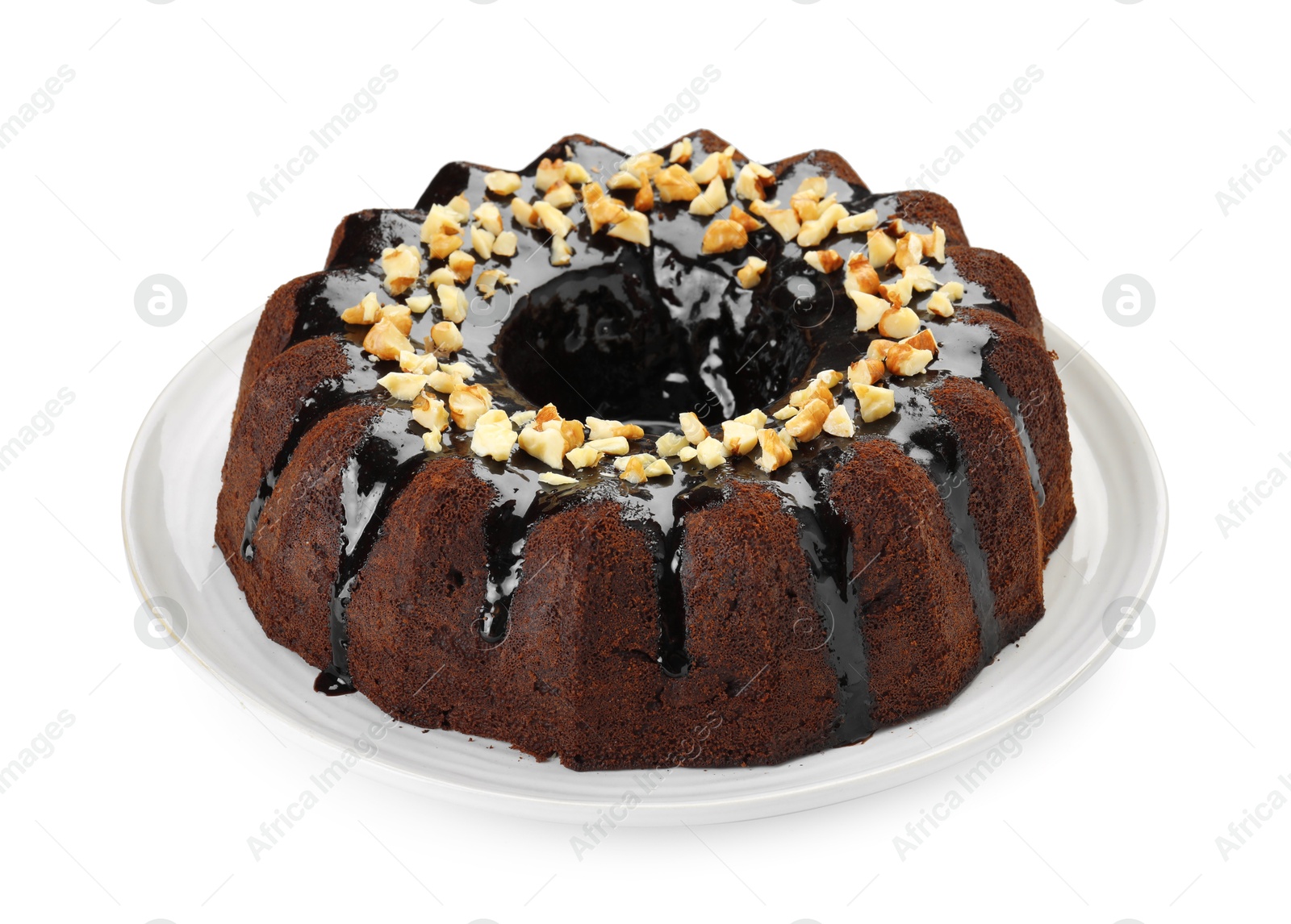 Delicious chocolate bundt cake with nuts isolated on white Photo of Delicious chocolate bundt cake with nuts isolated on white