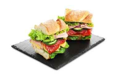 Photo of Tasty baguette sandwich with ham and vegetables isolated on white