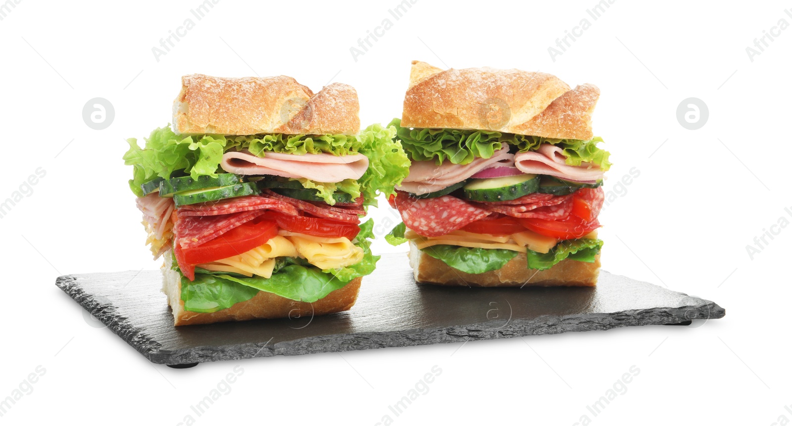 Tasty baguette sandwich with ham and vegetables isolated on white Photo of Tasty baguette sandwich with ham and vegetables isolated on white
