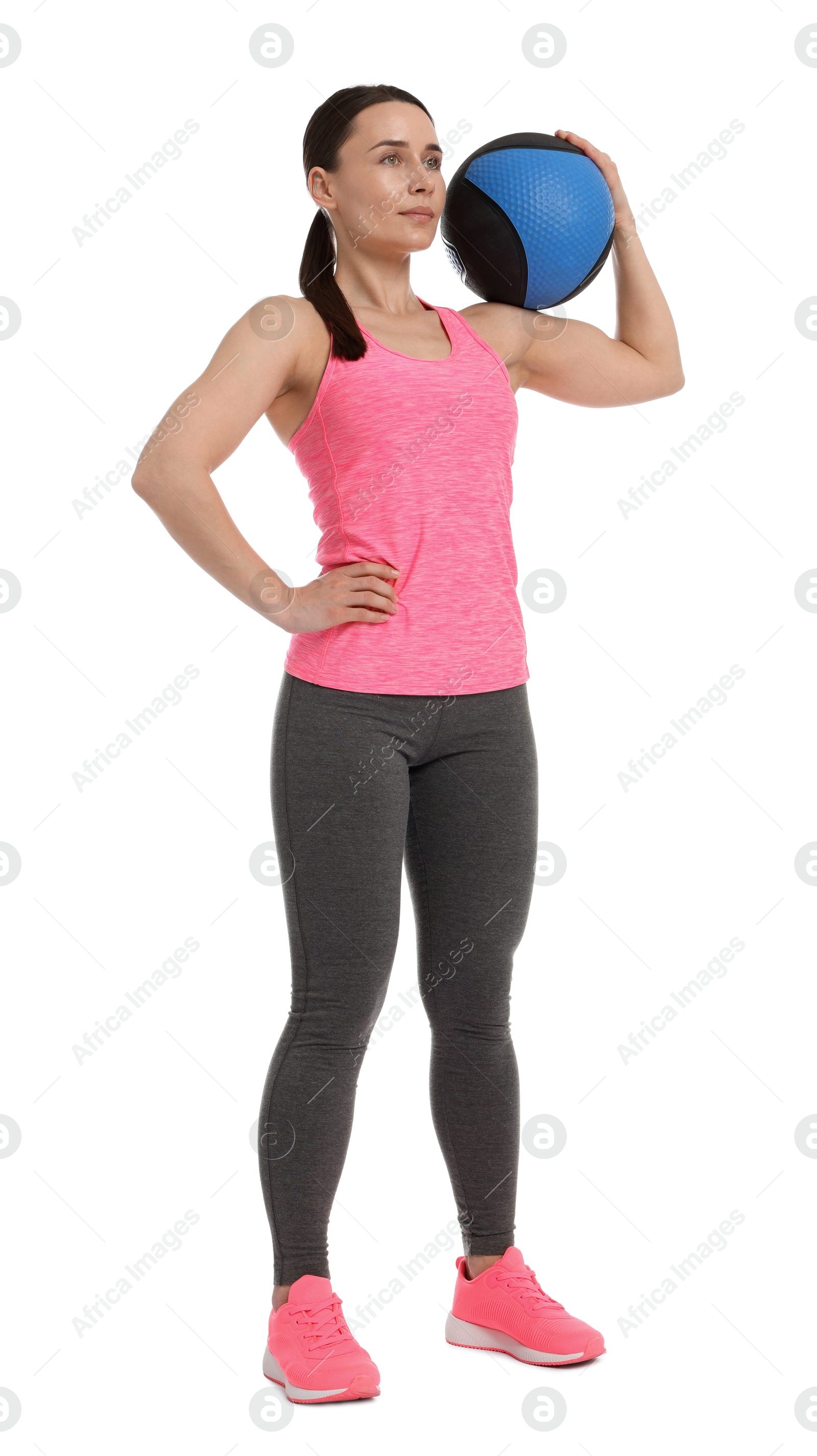 Woman with medicine ball on white background Photo of Woman with medicine ball on white background