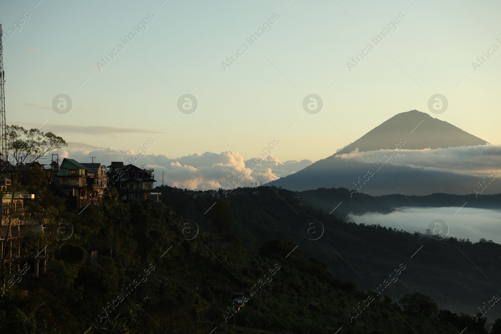 Picturesque view of mountains covered with fog Photo of Picturesque view of mountains covered with fog