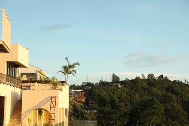 Photo of Beautiful villa with balconies near forest. Space for text
