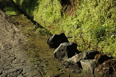 Photo of Rocks on pathway in mountains, closeup view