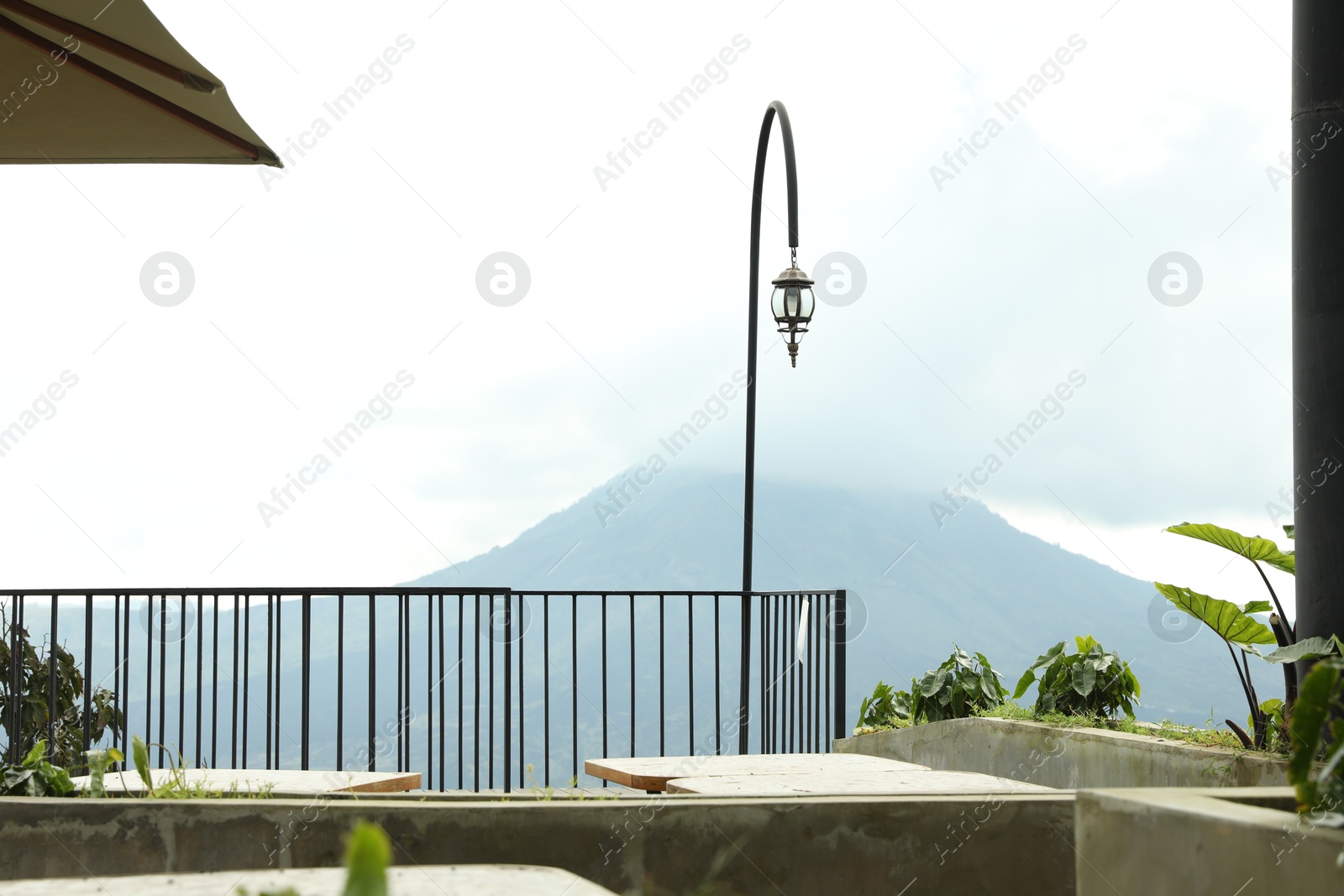View of stylish outdoor restaurant at mountain resort Photo of View of stylish outdoor restaurant at mountain resort
