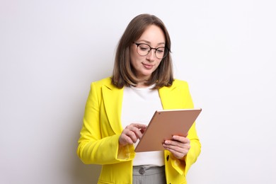 Photo of Woman with modern tablet on white background