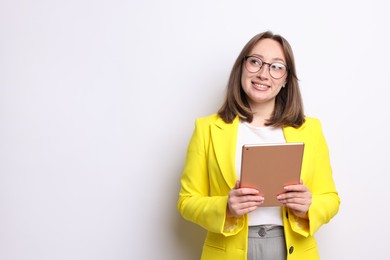 Photo of Woman with modern tablet on white background, space for text