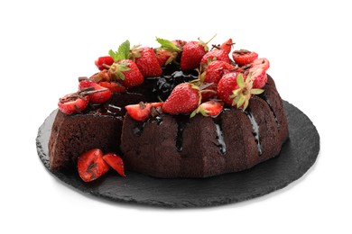 Photo of Delicious bundt cake with strawberries and chocolate shavings isolated on white