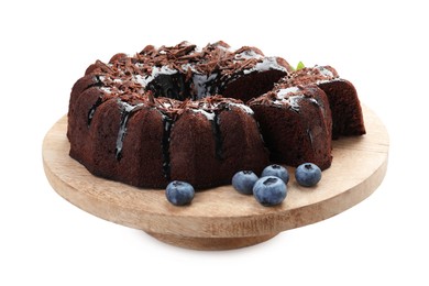 Photo of Delicious bundt cake with blueberries and chocolate shavings isolated on white
