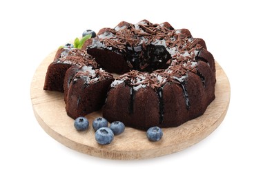 Photo of Delicious bundt cake with blueberries and chocolate shavings isolated on white