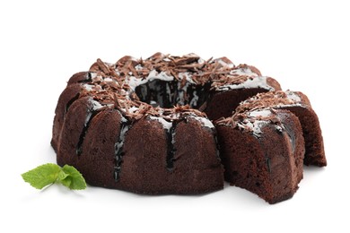 Photo of Delicious chocolate bundt cake and mint isolated on white