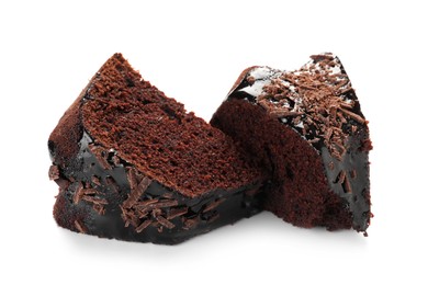 Photo of Pieces of delicious chocolate bundt cake isolated on white