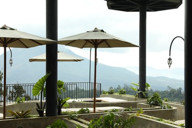Photo of View of stylish outdoor restaurant at mountain resort