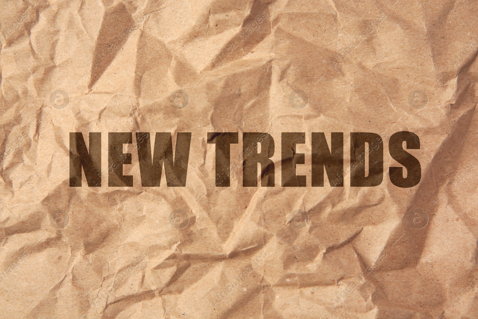 New Trends. Words on crumpled sheet of paper Image of New Trends. Words on crumpled sheet of paper