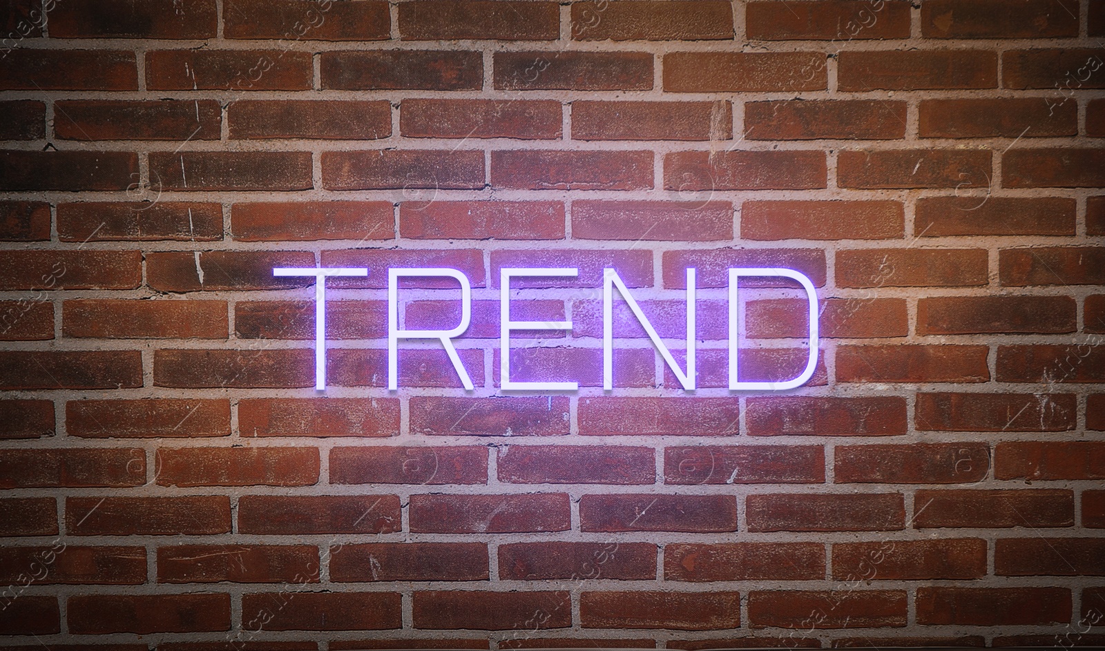 Neon sign with word Trend on brick wall Image of Neon sign with word Trend on brick wall