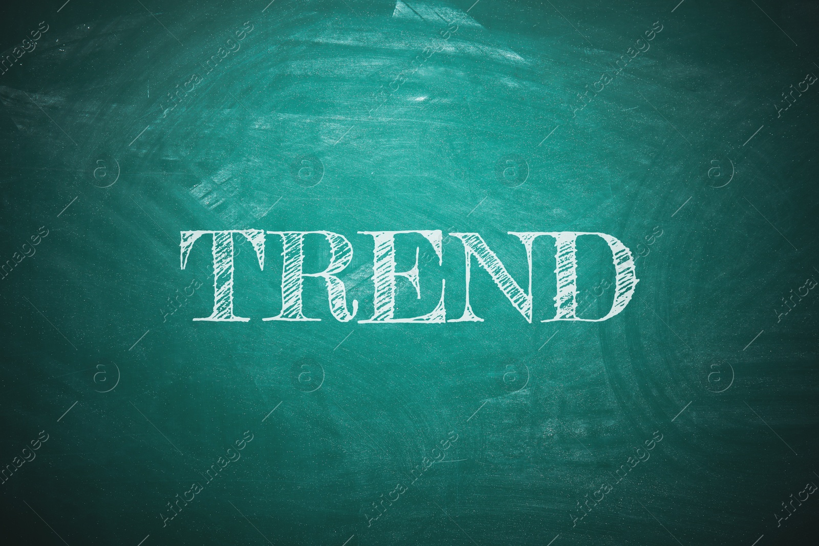 Trend concept. White word on green chalkboard Image of Trend concept. White word on green chalkboard