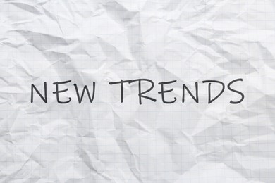Image of New Trends. Words on crumpled sheet of paper