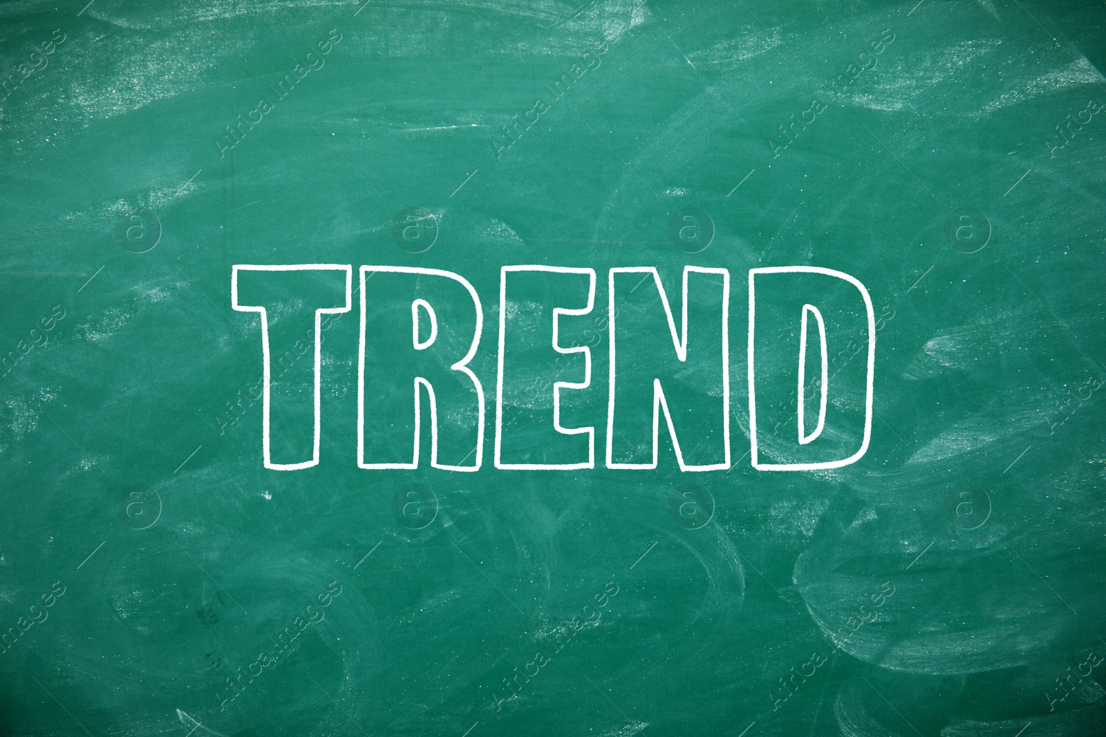 Trend concept. White word on green chalkboard Image of Trend concept. White word on green chalkboard