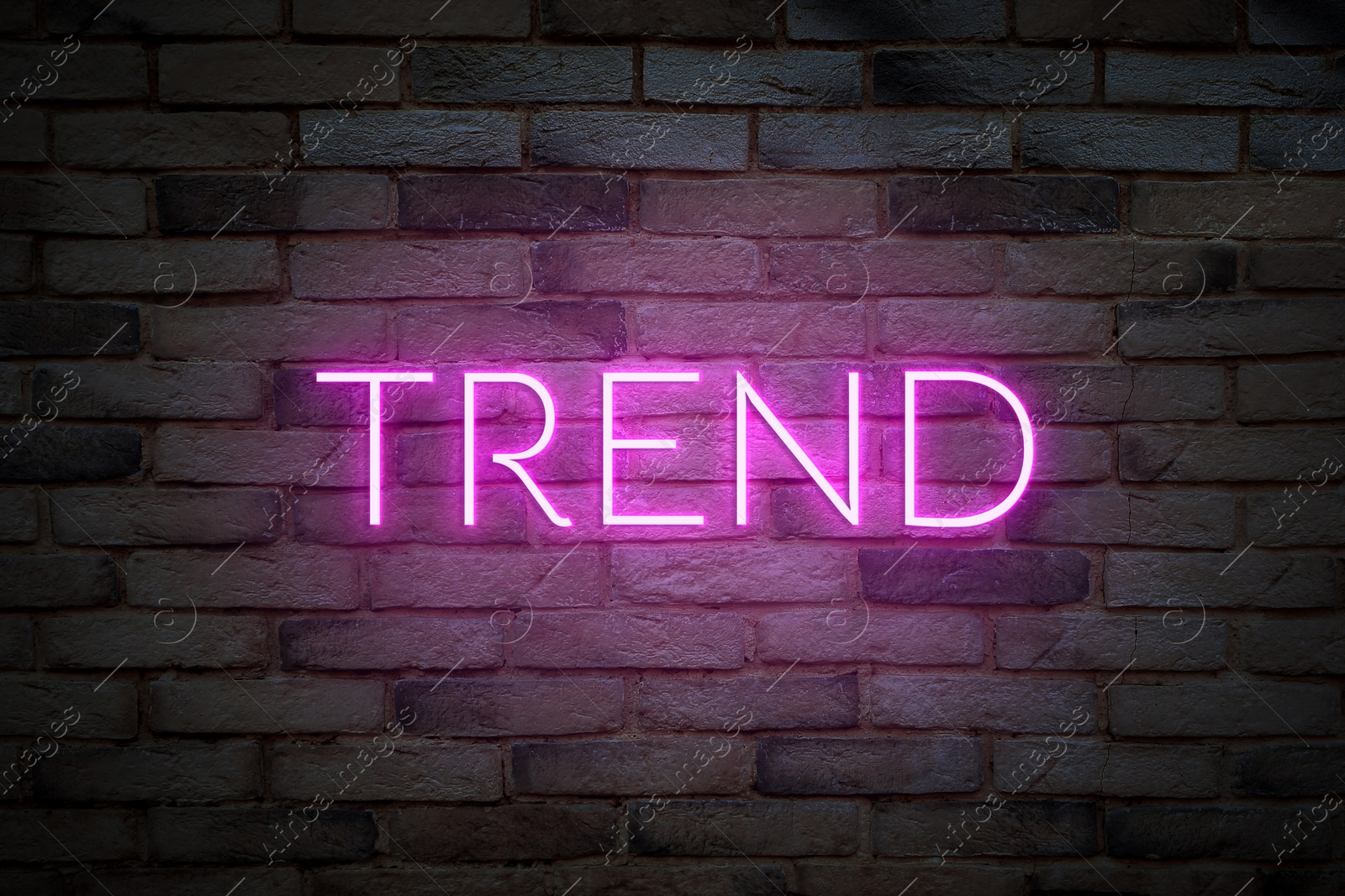 Neon sign with word Trend on brick wall Image of Neon sign with word Trend on brick wall