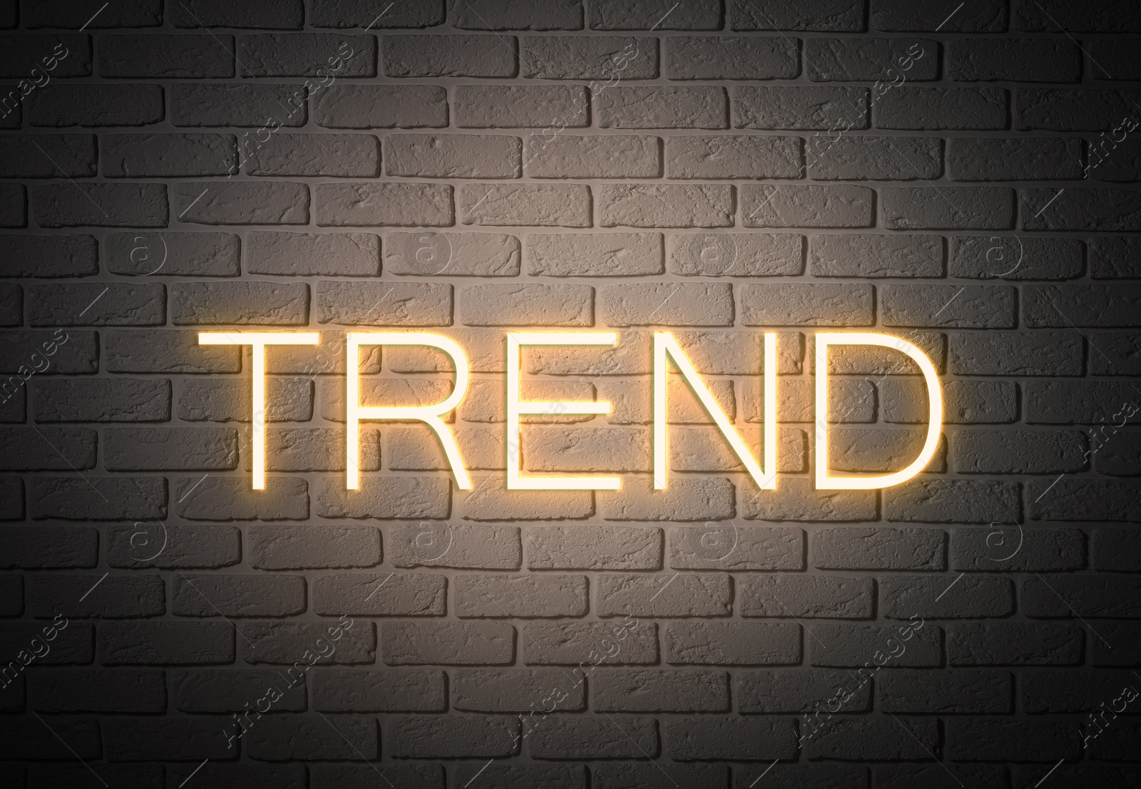 Neon sign with word Trend on brick wall Image of Neon sign with word Trend on brick wall