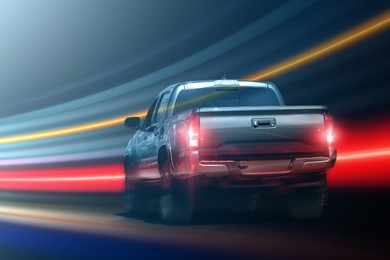 Image of Car driving fast. Speed light trails, motion blur effect