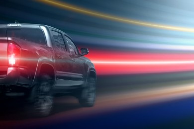 Image of Car driving fast. Speed light trails, motion blur effect