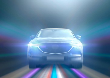 Image of Car driving fast. Speed light trails, motion blur effect