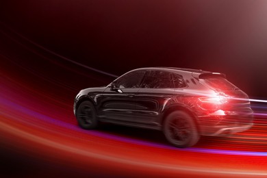 Image of Car driving fast. Speed light trails, motion blur effect