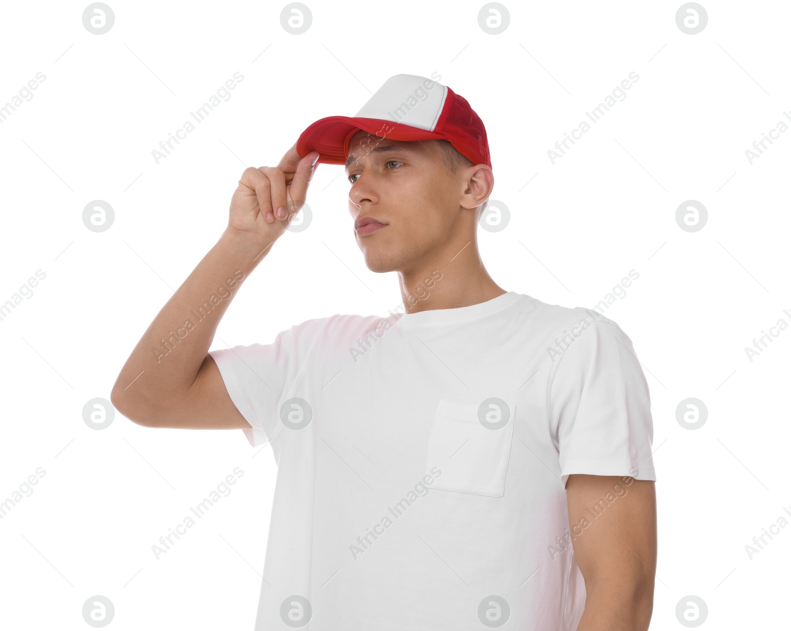 Young man wearing stylish baseball hat on white background Photo of Young man wearing stylish baseball hat on white background