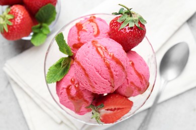 Photo of Tasty sorbet with strawberries and mint served on light table, flat lay