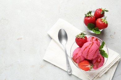 Photo of Tasty sorbet with strawberries and mint served on light table, flat lay. Space for text