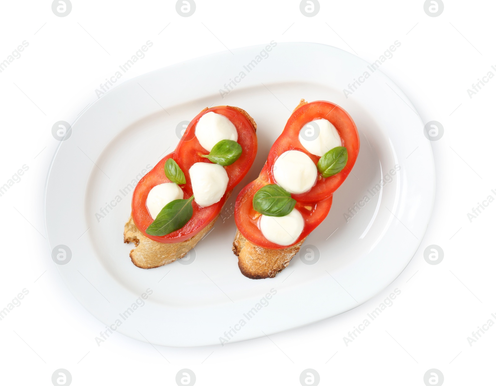 Tasty sandwiches with mozzarella cheese, tomatoes and basil on white background, top view Photo of Tasty sandwiches with mozzarella cheese, tomatoes and basil on white background, top view