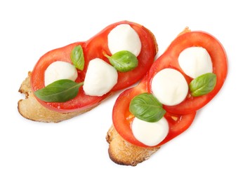 Photo of Tasty sandwiches with mozzarella cheese, tomatoes and basil on white background, top view