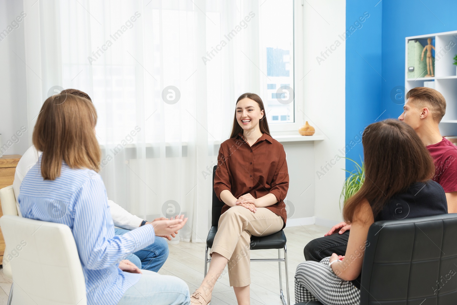Group of people having meeting during life coaching class indoors Photo of Group of people having meeting during life coaching class indoors