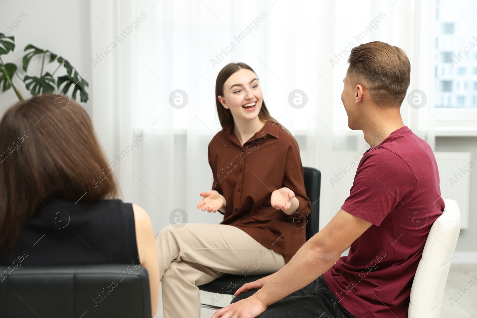 Photo of Group of people having meeting during life coaching class indoors