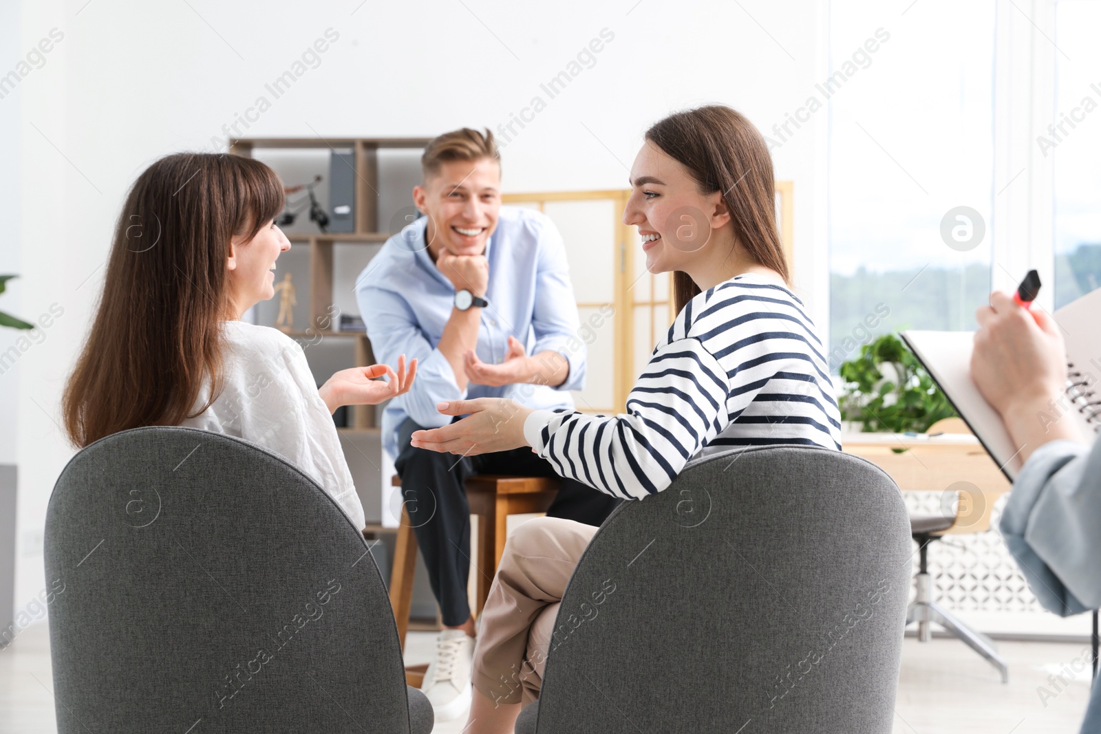 Group of people having meeting during life coaching class indoors Photo of Group of people having meeting during life coaching class indoors