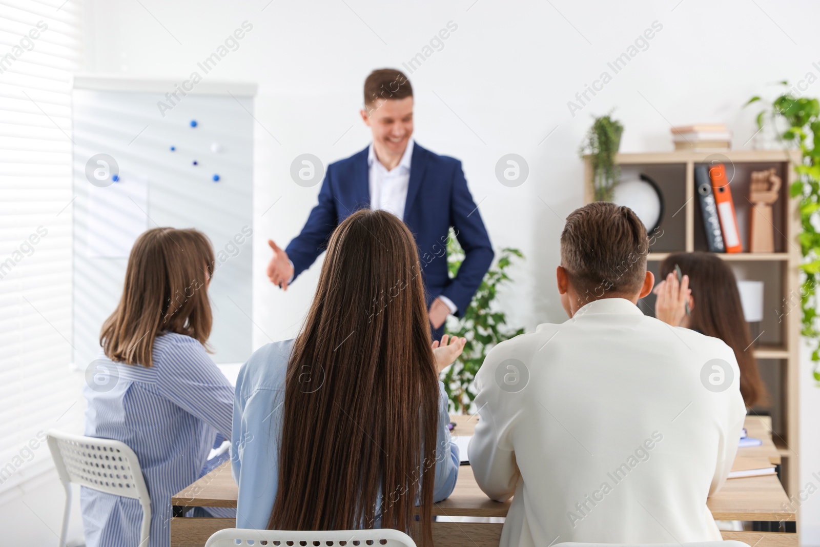 Group of people having meeting during life coaching class indoors Photo of Group of people having meeting during life coaching class indoors