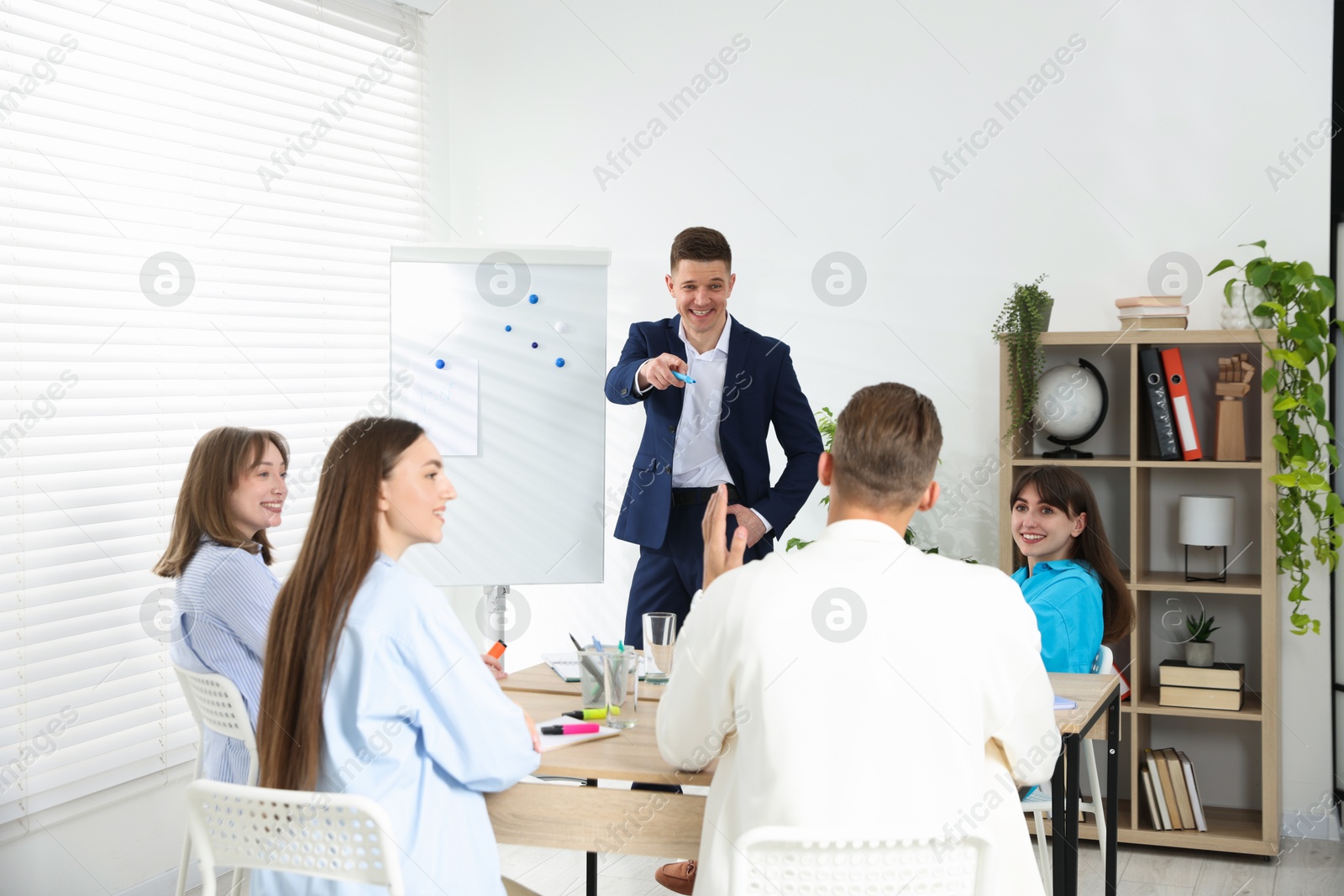 Group of people having meeting during life coaching class indoors Photo of Group of people having meeting during life coaching class indoors